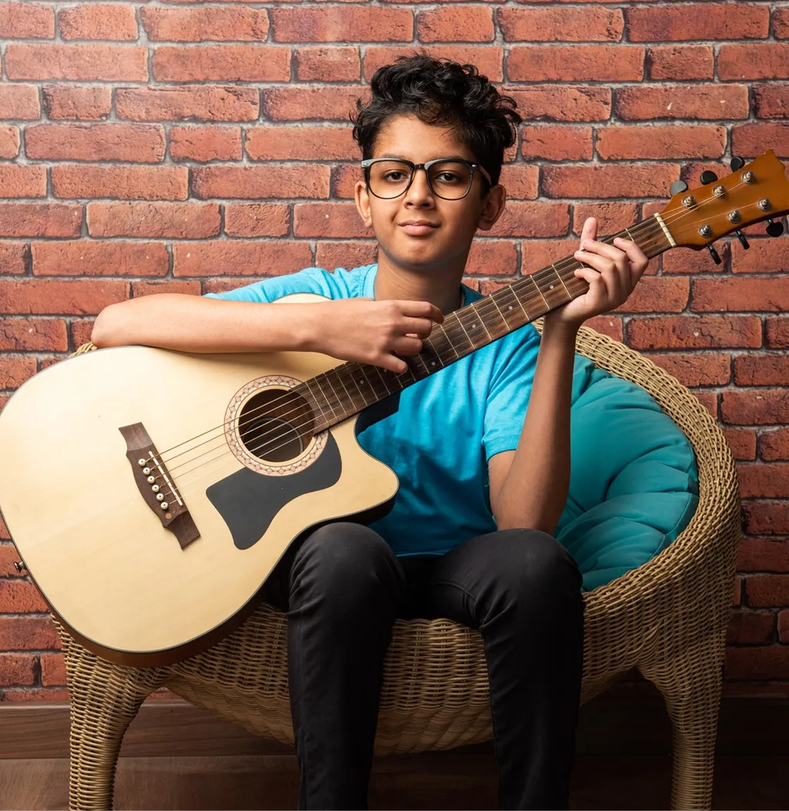 Student learning guitar